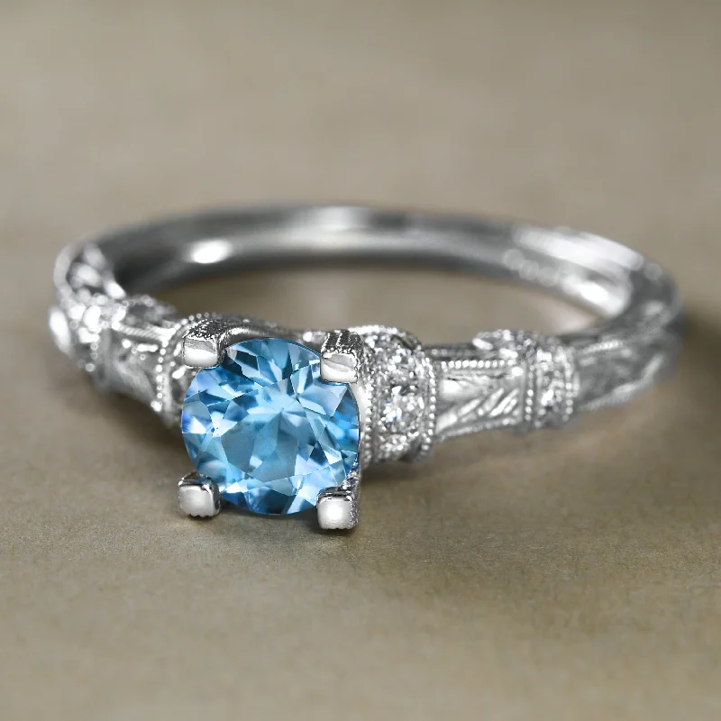 women's channel setting ring-Embellished Blue Topaz Ring