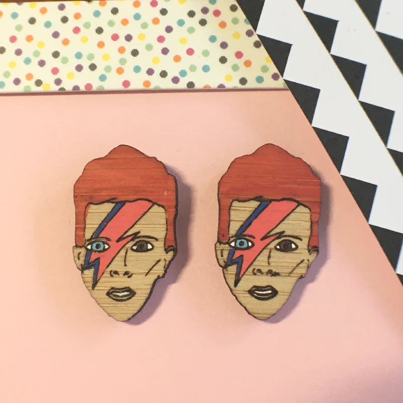 women's topaz ring-Face Studs: David Bowie