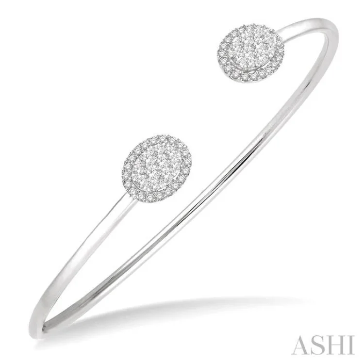 women's multi-layer necklace-5/8 Ctw Oval Shape Lovebright Open Cuff Diamond Bangle in 14K White Gold